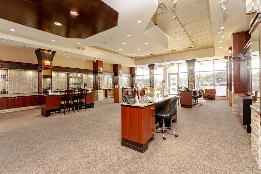 Auburn Hills Eye Care showroom with frame displays and fitting tables