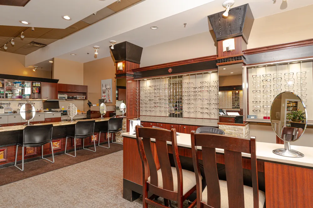 Frame displays, mirrors, and fitting tables at Auburn Hills Eye Care